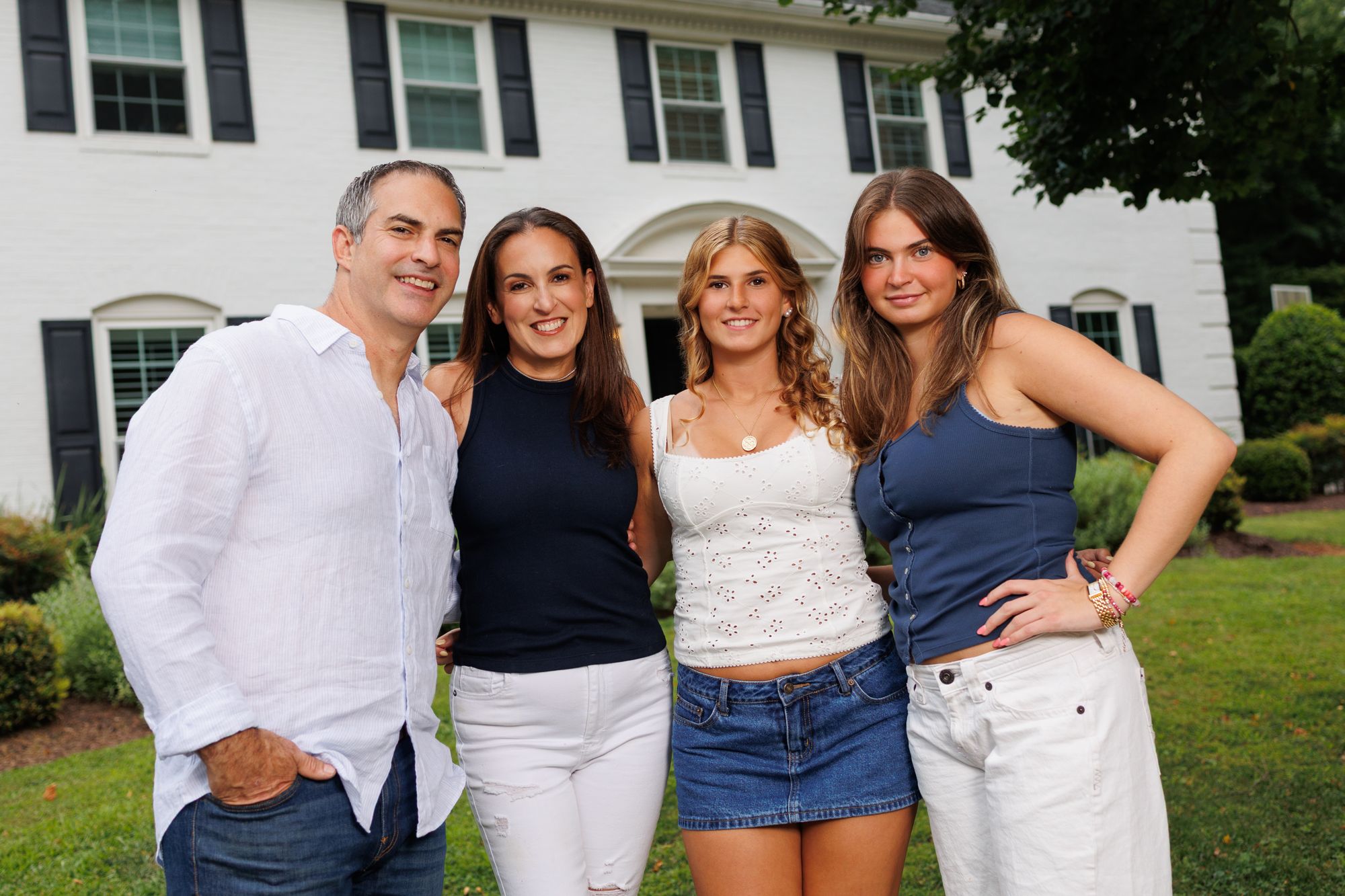 Family portrait on the front lawn by Alison Tremblay